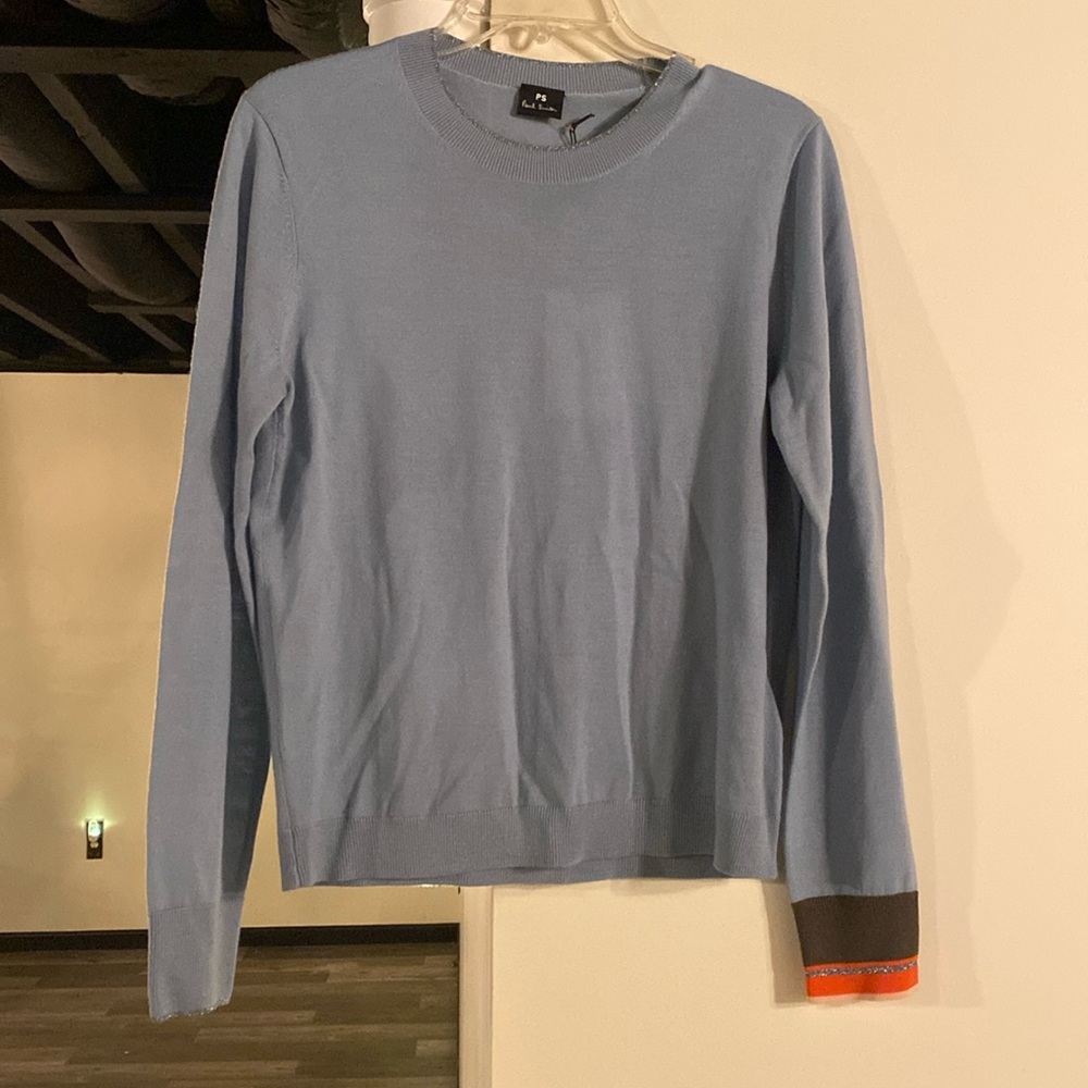 Blue light sweater in perfect condition with tags